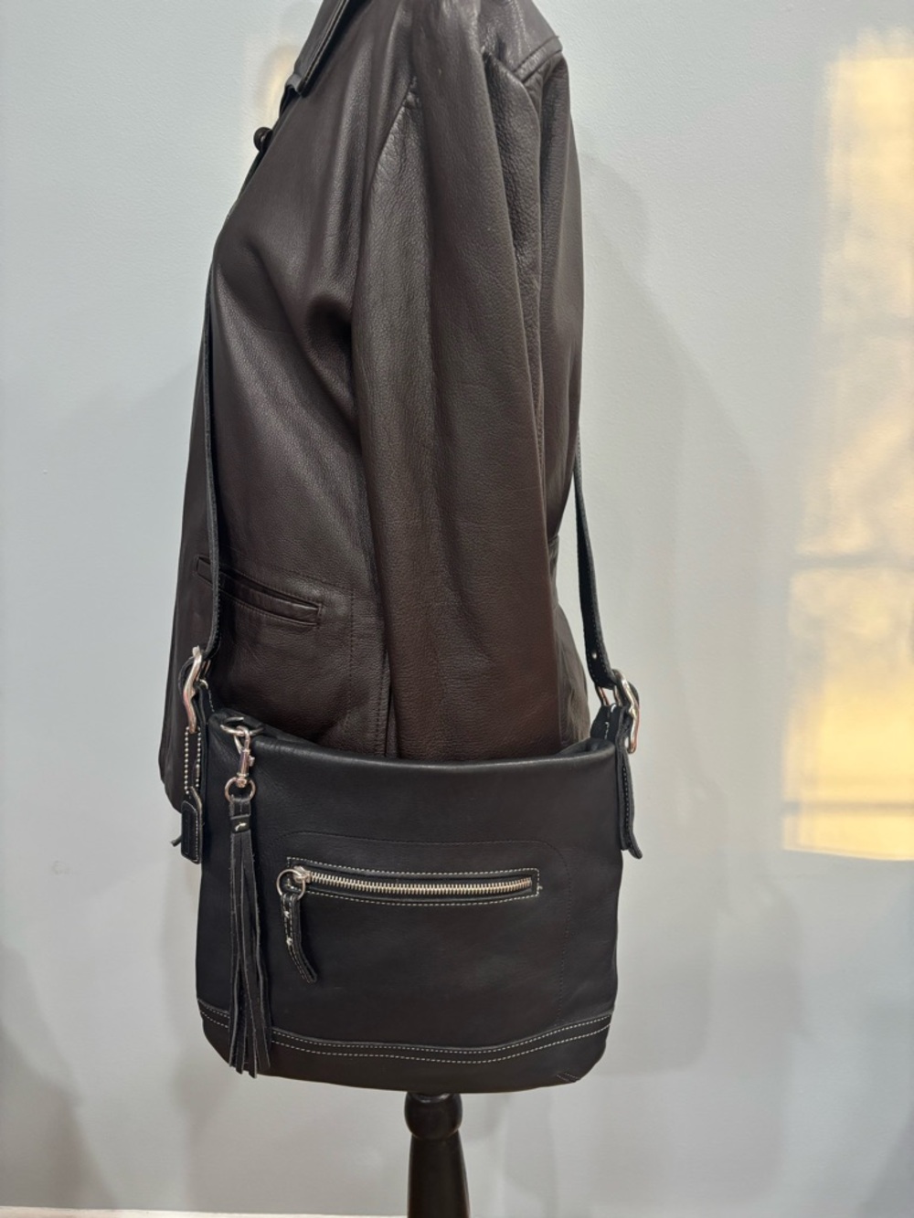 Vintage Coach black leather crossbody or shoulder bag with tassel Style#1415